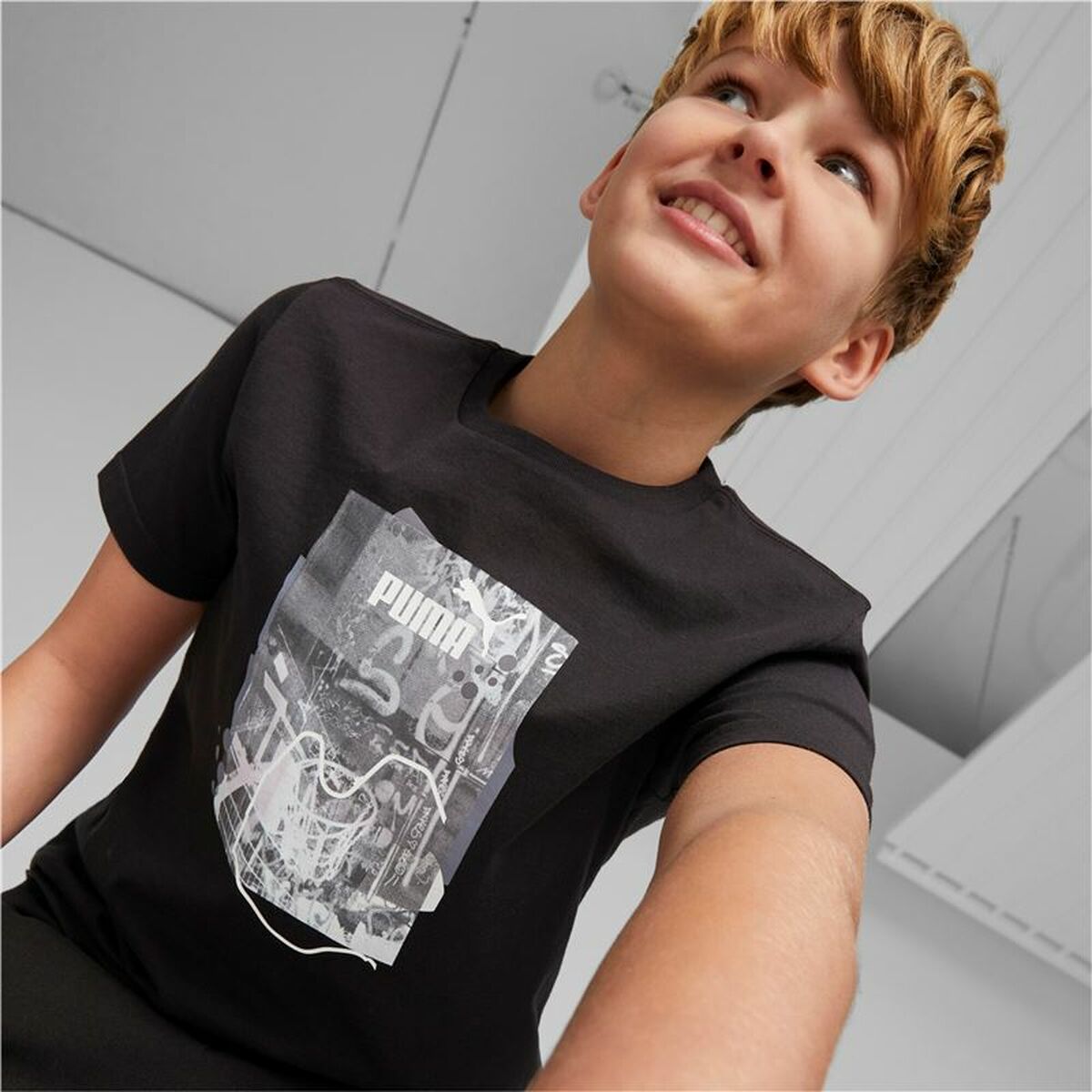 Jungen Kurzarm-T-Shirt Puma Essentials+ Street Art Grap Schwarz